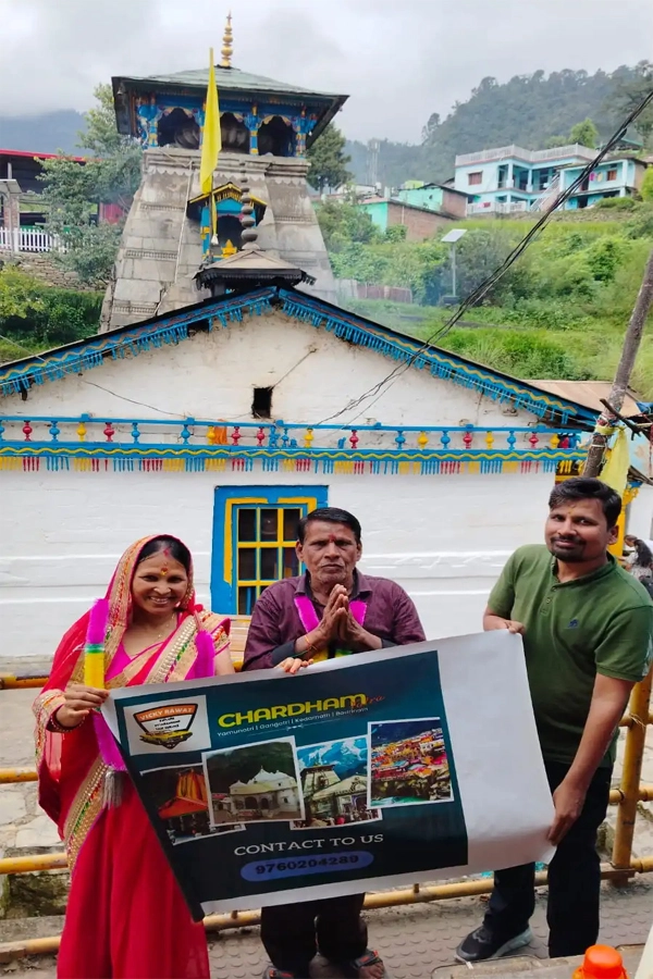 Past Chardham Yatra 2024 clients standing in front of the Triyuginarayan Temple, capturing a moment of their spiritual journey
